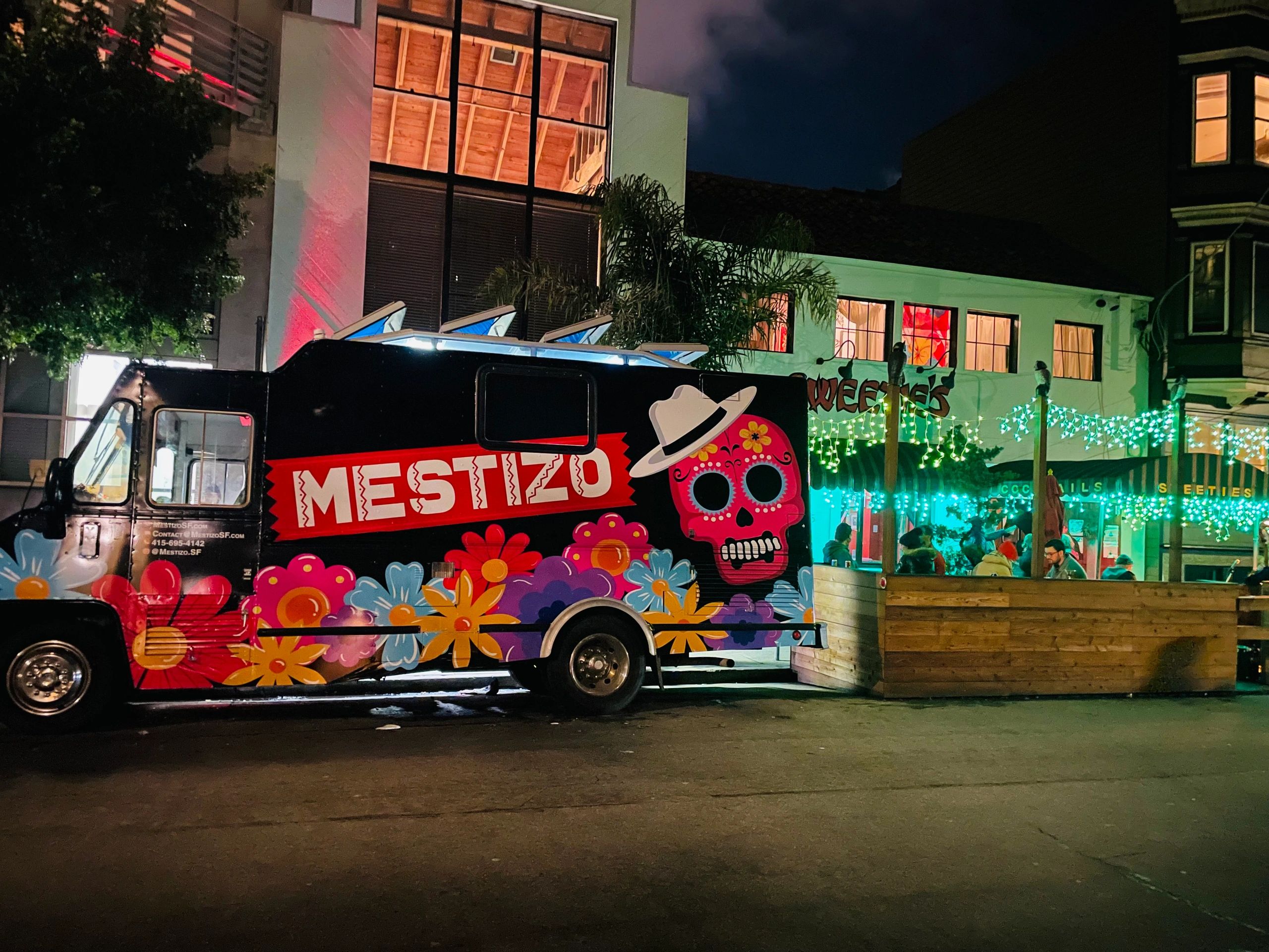 Mestizo food truck at night